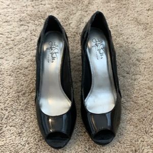 Black peep-toe pumps